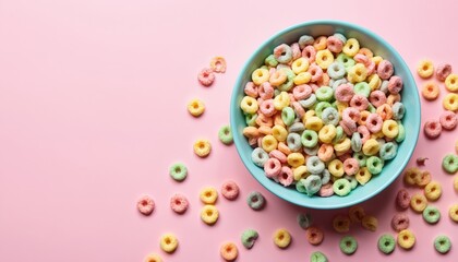 Close-up of colorful fruit cereal loops in bowl with scattered pieces on pastel pink background. Vibrant, playful cereal offers sweet, crunchy breakfast snack. Bright, nostalgic appeal evokes
