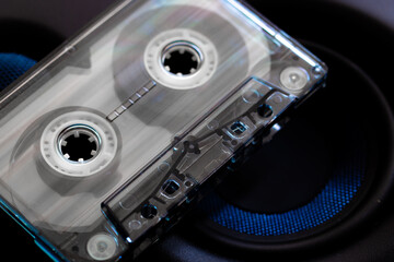 Transparent Audio Cassette on a Dark Background