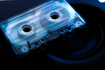 Transparent Audio Cassette on a Dark Background
