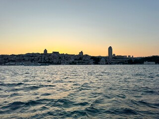 Naklejka premium View of the Beşiktaş district in Istanbul, captured during sunset. Turkey. 