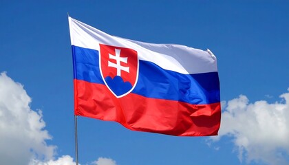 Slovakian flag billowing in a clear sky