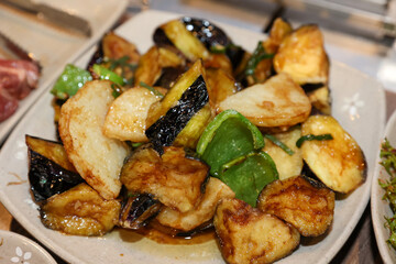 Stir-fried Potatoes, Eggplant, and Peppers. Chinese food