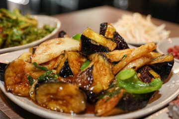 Stir-fried Potatoes, Eggplant, and Peppers. Chinese food