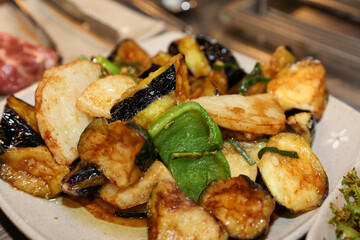 Stir-fried Potatoes, Eggplant, and Peppers. Chinese food
