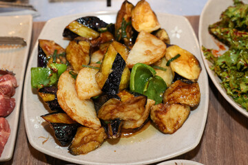 Stir-fried Potatoes, Eggplant, and Peppers. Chinese food