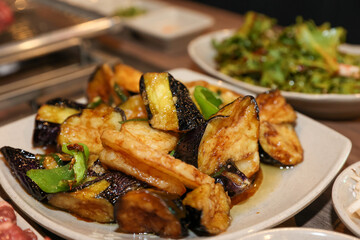 Stir-fried Potatoes, Eggplant, and Peppers. Chinese food
