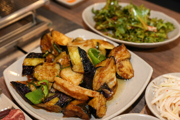 Stir-fried Potatoes, Eggplant, and Peppers. Chinese food