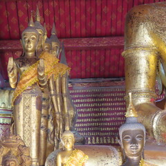 Golden Buddhist art in an ancient temple in Luang Prabang, northern Laos