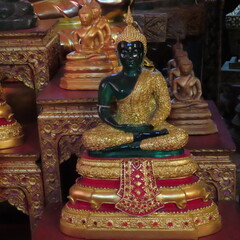 Golden Buddhist art in an ancient temple in Luang Prabang, northern Laos