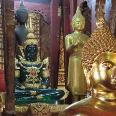Golden Buddhist art in an ancient temple in Luang Prabang, northern Laos