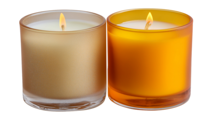 Two lit candles in glass containers