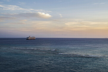 Modern luxury cruiseship cruise ship liner Koningsdam, Nieuw Statendam or Rotterdam in port of Oranjestad, Aruba ABC Islands tropical paradise during Caribbean dream vacation cruising