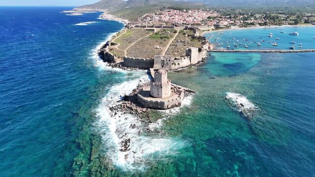 Aerial drone view of the Bourtzi tower and Methoni Castle in Messinia, Greece