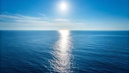 Fototapeta premium Vast Ocean Expanse Tranquil Blue Waters Under a Sunny Sky, Reflecting Sunlight's Brilliance