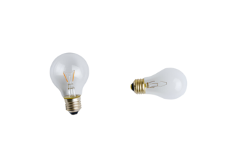 Two incandescent light bulbs on a transparent background