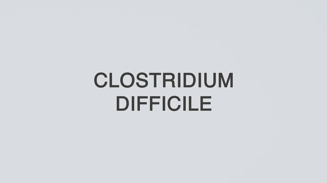 Clostridium difficile word diagnosed with a stethoscope held in hand on a white background, illustrating bacterial infection, medical diagnosis, healthcare concept, and awareness