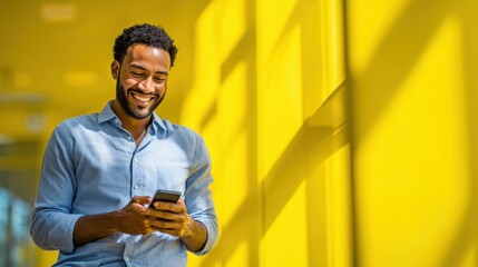 Smiling client using the Banco do Brasil app on a smartphone, wearing a light blue shirt and dark jeans. Background in a bright, modern, and digital environment