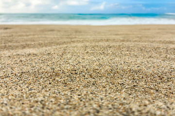 Idyllic Tropical Beach with Golden Sand, Crystal Clear Water, and Blue Sky. Summer Vacation, Relaxation, Nature Escape, Seaside Peaceful Horizon, Travel Background, for tourism and nature lovers.