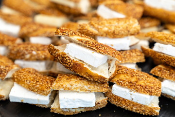 coffee break hotel during conference meeting, corporate revent with tea and coffee catering, decorated catering banquet table with variety of different pastry and bakery, with croissants and cookies