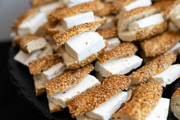 coffee break hotel during conference meeting, corporate revent with tea and coffee catering, decorated catering banquet table with variety of different pastry and bakery, with croissants and cookies