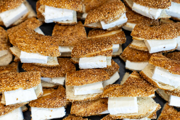 coffee break hotel during conference meeting, corporate revent with tea and coffee catering, decorated catering banquet table with variety of different pastry and bakery, with croissants and cookies