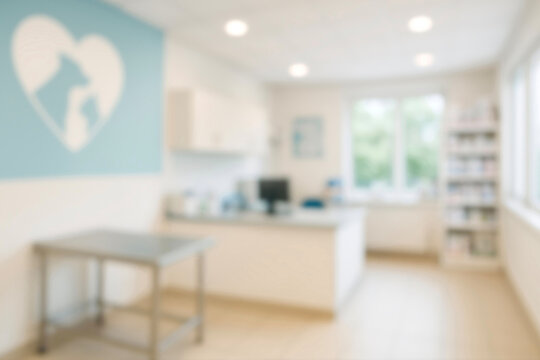 Modern veterinary clinic interior with exam table and equipment, clean bright animal hospital, pet healthcare concept, blurred background for copy space, professional vet office design