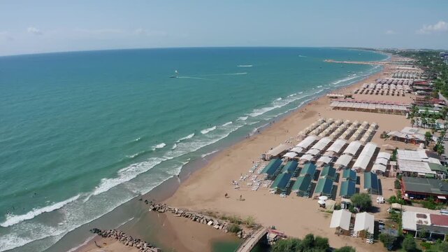 Aerial View Of The Beach On Turkish Riviera. Side, Mediterranean Sea Coast, Touristic Beach Antalya, Turkey drone photo view.