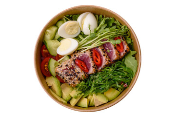 Seafood bowl, tuna tataki fillet slices with rice, oranges, tomatoes and sauce. Tuna bowl