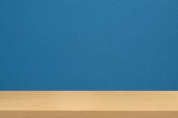 Empty wooden table top and color blue wall background for showing products and advertisers. Template mock up for display of product. product promotion in the wall. for display or montage.