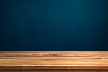 Empty wooden table top and color blue wall background for showing products and advertisers. Template mock up for display of product. product promotion in the wall. for display or montage.