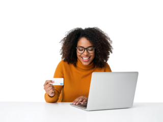Cheerful young woman using credit card while doing online shopping using laptop with isolated