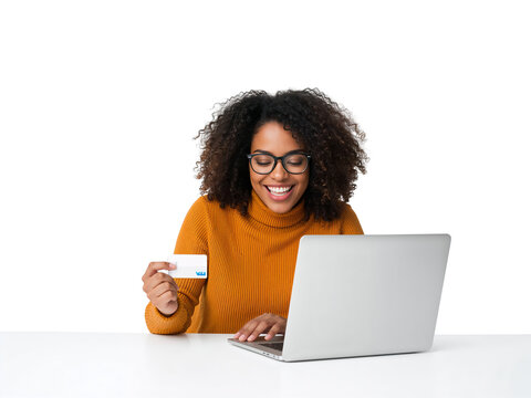 Cheerful young woman using credit card while doing online shopping using laptop with isolated