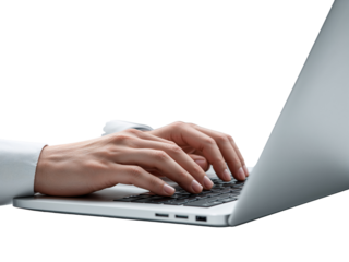 A close-up image of typing hands on a modern laptop against an isolated background