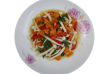 Stir-fried mushrooms with basil Delicious dish , carrots, and chili  stir fry looks scrumptious and ready to eat a vegetarian dish