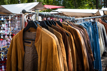 vintage leather jackets on second hand flea market ,