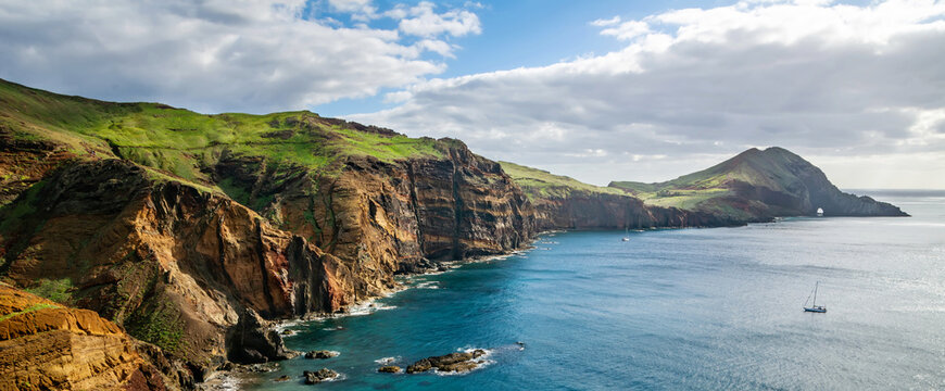 Beautiful scenic view of the peninsula of Ponta de Sao Lourenco with cliffs, Atlantic Ocean and blue sky. Artistic picture. Beauty world.