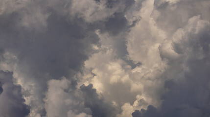 Stormy sky with dark clouds. Dramatic cloudscape. Background of storm clouds. Moody sky with heavy clouds. Stormy cloud. Sky before the storm. Sky after the rain. Scattered clouds. Stormy skies.