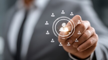 Businessman interacting with a digital network of people icons on a futuristic interface