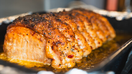 Succulent roast pork with crispy golden crackling, beautifully glazed and seasoned with garlic, rosemary, and fresh herbs. Perfectly slow-roasted for tender, flavorful meat. Professional food photogra