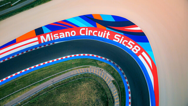Driving school. Aerial view of the race track open for motorcycle training. Asphalt road. Drone footage. Group of motorcyclists on motorcycles. Motorsport. Italy, Misano, 21.07.2025