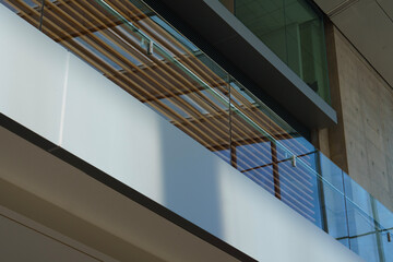 Looking up to a glass balcony