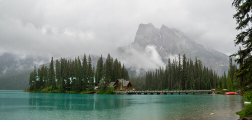 Emerald Lake island below the clouds and the mountain, Jasper NP, Canada