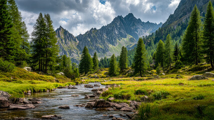 Serene mountain valley with flowing stream and lush greenery under a partly cloudy sky