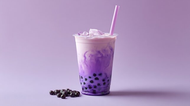 Delicious taro bubble tea drink with tapioca pearls and ice cubes on a purple background perfect aesthetic drink