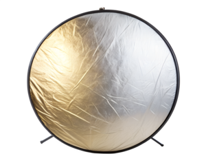 Collapsible photography reflector with gold and silver sides isolated on transparent background