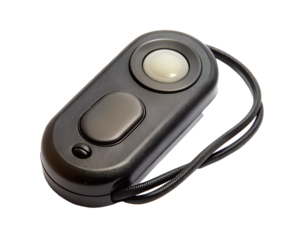 Black camera remote shutter release button with cord isolated on transparent background