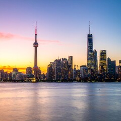 Obraz premium City skyline at sunset with glowing lights and dramatic sky