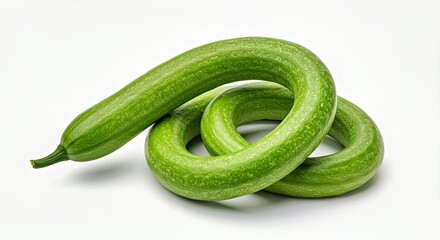  Snake gourd coiled loosely on white background 