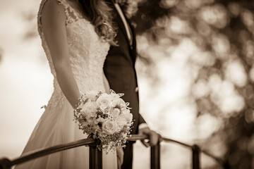 A wedding couple without facial recognition. The most beautiful day of their lives. A symbolic image for the wedding.