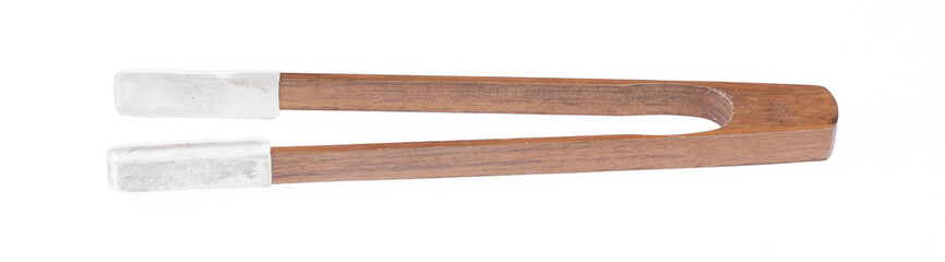 wooden clothes tongs isolated on white background